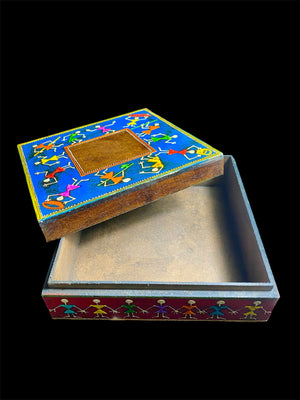 This charmingly painted box features one single, square compartment and features a lid that lifts off completely. The roominess of the box means it is perfect for holding everything from trinkets to jewellery and keys. A lovely, hand painted piece of craftsmanship from Rajasthan, India.
Every box is hand painted differently so expect variation I colour and pattern when ordering.
Measurements: width 20, depth 20 cm, height 7.5 cm