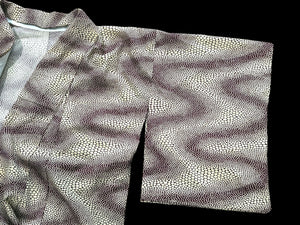 Traditional vintage Japanese kimono with a red stingray skin pattern on a cream background. Brand new.