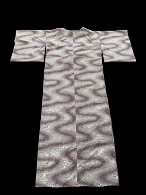 Traditional vintage Japanese kimono with a red stingray skin pattern on a cream background. Brand new.