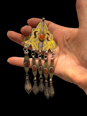 Tekke Turkoman women's pendant. High grade silver, 24k gold fire gilding, carnelian stones. All dangles are original. Early 20th C, height 15 cm