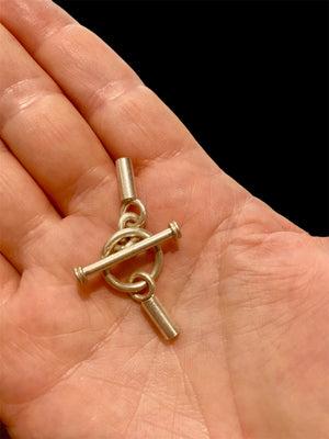 Large sterling silver toggle bars and matching connector rings with glue-in cord end caps. Price is per pair, two ends to complete a necklace. Total length of joined clasp 4.5 cm. Inside diameter of glue in end 3 mm