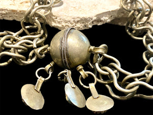 Vintage (1920 - 1940) Moroccan Berber cloak chain. Coin Silver. Set with glass "gems", engraved box finials, ball centrepiece. Length 57 cm