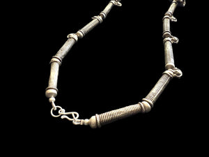 Unique necklace of antique silver components - Afghan tube beads, Turkoman pendant, double amulets from Pakistan and small Indian bell pendants. Length 56 cm