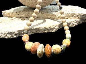 Tribally inspired, pastel toned stone necklace featuring pale turquoise, bloodstone, jasper and sterling silver. Length 50 cm