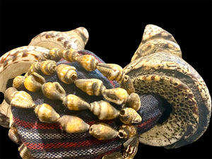 Bontoc woman’s belt (akusan). Cloth, shell, bone. Early 20th century. Bontoc people, Bontoc region, Philippines. Length 91 cm, length of longest shell 6.5 cm