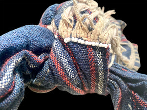 Bontoc woman’s belt (akusan). Cloth, shell, bone. Early 20th century. Bontoc people, Bontoc region, Philippines. Length 91 cm, length of longest shell 6.5 cm