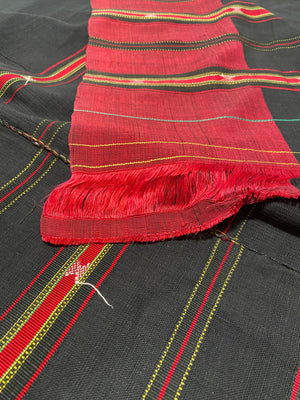 Waziri men's shawl or chador, Northwest Frontier Pakistan/Afghanistan. Hand loomed in two pieces sewn together. Dark indigo/black cotton body is woven with red silk and a stripped patterned border as contrast. Early 20th C, most likely an heirloom piece used only once. In superb condition without blemish. 231 x 134 cm