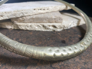 Solid cast & chiselled hansuli torque. rural Gujarat, India. Coin silver. 19th century. Width 16 cm, width at opening 7 cm. Weight 260 g