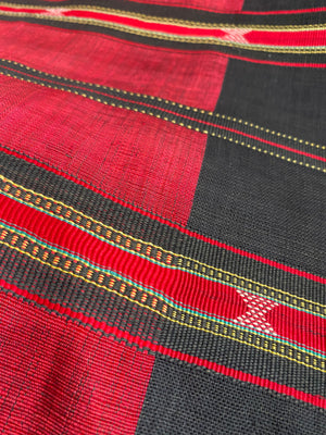 Waziri men's shawl or chador, Northwest Frontier Pakistan/Afghanistan. Hand loomed in two pieces sewn together. Dark indigo/black cotton body is woven with red silk and a stripped patterned border as contrast. Early 20th C, most likely an heirloom piece used only once. In superb condition without blemish. 231 x 134 cm