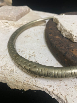 Solid cast & chiselled hansuli torque. rural Gujarat, India. Coin silver. 19th century. Width 16 cm, width at opening 7 cm. Weight 260 g