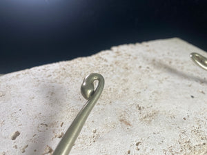 Solid cast & chiselled hansuli torque. rural Gujarat, India. Coin silver. 19th century. Width 16 cm, width at opening 7 cm. Weight 260 g