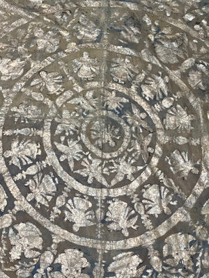 Pichwai temple hanging, silver leaf on a ground of handwoven cotton, featuring Krishna, gopis and apsaras. This devotional cloth hanging was made by Shri Nathji devotees of the Pushti Marg Sect. A large and rare circular-patterned example dating to late 19th Century and a collector's item. Measurements: 173 x 157 cm