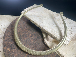 Solid cast & chiselled hansuli torque. rural Gujarat, India. Coin silver. 19th century. Width 16 cm, width at opening 7 cm. Weight 260 g