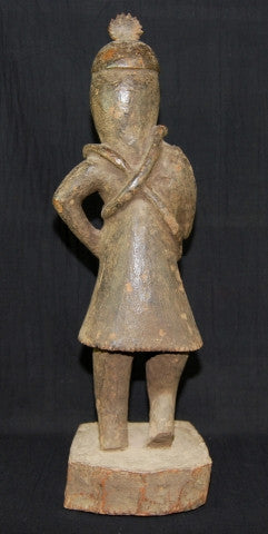 Naga Ancestor Figure - Antique Hardwood Statue Naga antique tribal statue, an ancestor figure with right hand raised in protection, head adorned with plumed cap. Two snakes are wrapped around the torso, their heads resting on the shoulders, dressed in a fringed kirtle. 19th C or earlier, well preserved with an aged patina. Height 56 cm, width 16.5 cm, depth 15 cm