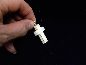 Howlite stone cross pendant, with sterling silver mount and ring bail, and a tiny silver ball detailing at the base of the cross. Thick cut and chunky in design, this would look great on a silver chain or a leather cord. Suitable as men's jewellery or women's jewellery.