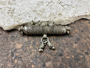 High grade, heavy silver amulet with fused ends, mid 19th century, from Afghanistan. Length 8.5 cm