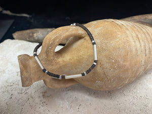 One of our signature coconut silver bracelets, crafted from polished coconut wood and hill tribe 95% silver., with sterling silver lobster clasp. A women's bracelet or a men's bracelet, it has a casual Boho vibe, and is made for that stacked bracelet look. Different sizes available