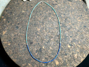 Fine necklace of lapis lazuli and turquoise hand cut beads, highlighted with sterling silver