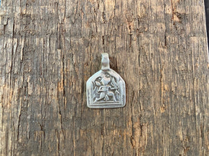 Antique silver amulets representing the Hindu god Hanuman, traditionally worn for protection and good luck. Originating in southern India, and dating from the early 19th - early 20th century.  All vary between 1.4 and 1.7 cm in width