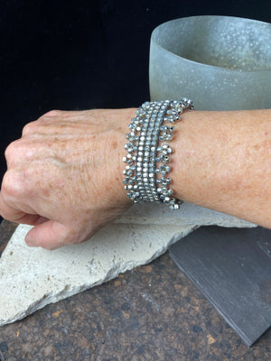 Silver look fashion tribal bracelet on stretchy elastic