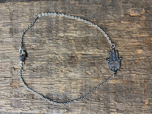 Hamsa anklet features a hamsa pendant on a fine chain and is made from a non-allergenic white metal that looks exactly like silver and will not ever tarnish, rust or wear
