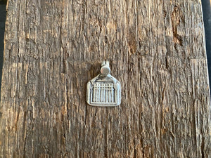 Antique silver amulets representing the Hindu god Skanda and the seven mothers, traditionally worn for protection. Early 19th - early 20th century