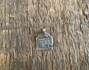 Antique silver amulets representing the Hindu god Skanda and the seven mothers, traditionally worn for protection. Early 19th - early 20th century