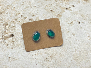 Small chrysoprase earring studs are hand made from sterling silver and set with clear green chrysoprase cabochons. A unisex earring