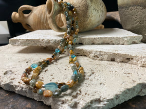 A casual beach vibe necklace made from two strands of polished pebble ocean jasper, highlighted with clear blue apatite and sterling silver. Our necklace is finished with a sterling silver hook clasp and findings and is 49 cm in length