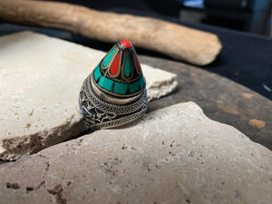 A heavy and substantial vintage ring from Turkmenistan. Sterling silver, turquoise and coral inlay, mid 20th century, size 9.25