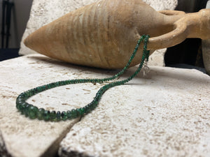 Stunning natural emerald necklace of perfectly drilled and graduated cabochon cut African emeralds finished with a sterling silver hook clasp. Not dyed or heat treated. Premium stringing on jeweller's monofilament. Length 44 cm, 52.6 Ct.