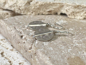 Our most popular earring. Karen hill tribe charms of high grade silver finished with sterling silver hooks. Charm 1.5 cm diameter, earring length 2.8 cm including hook