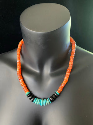 Chunky statement necklace with a southwest vibe, made from heshi cut carnelian beads, onyx and natural Arizona turquoise, finished with sterling silver beads and hook clasp. A one-off unisex necklace that will look stunning on a guy or girl. Measurements: 53 cm (21")