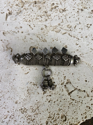 High grade, heavy silver amulet with fused ends, mid 19th century, from Afghanistan. Length 8.5 cm