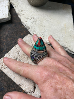 A heavy and substantial vintage ring from Turkmenistan. Sterling silver, turquoise and coral inlay, mid 20th century, size 9.25