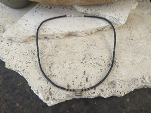 One of our signature coconut silver necklaces, crafted from polished enriched coconut wood, Karen hill tribe 95% silver beads, and a sterling silver clasp. A women's necklace or a men's necklace, it has a casual Boho vibe. Different lengths available