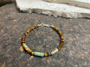Stunning natural Arizona blue-green-brown turquoise and tiger's eye beaded bracelet. Sterling silver findings. Length 18.5 cm