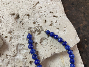 Lapis lazuli bead and silver pendant necklace. Natural lapis and sterling silver or higher grade. 