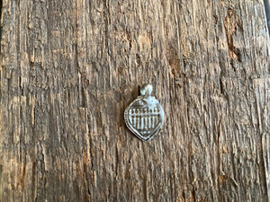 Antique silver amulets representing the Hindu god Skanda and the seven mothers, traditionally worn for protection. Early 19th - early 20th century