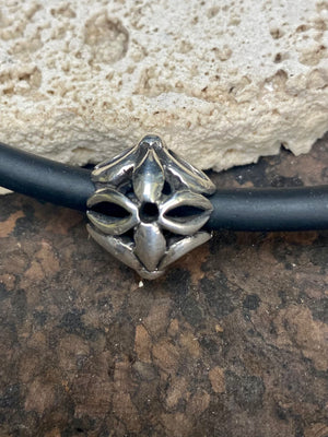 A heavy handmade bead, which can be worn on its own as a pendant or added to other beads on a bracelet or necklace. Sterling silver. Diameter 2.5 cm, hole 0.5 cm