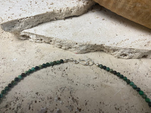 Contemporary necklace of round natural African turquoise, highlighted with sterling silver beads, a vintage Indian filigree silver pendant and sterling silver findings and clasp. Length 43.5 cm (17.25”), pendant 2.2 cm (1")
