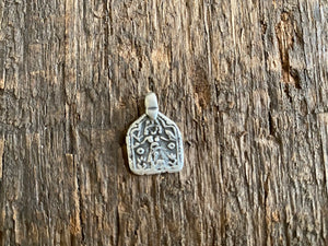 Antique silver amulets represent the Hindu goddess Kansari, goddess of the harvest and of fertility. These small pendants are traditionally worn for good luck, to increase fertility and to bring all good things to you and your home. These pendants date from the early 19th - early 20th century. Measurements: all vary between 1.4 and 1.8 cm in width