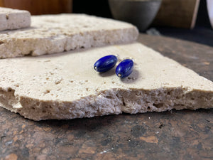 Lapis lazuli natural bead earrings with sterling silver mounts and hooks, finished with small silver beads at the base. and