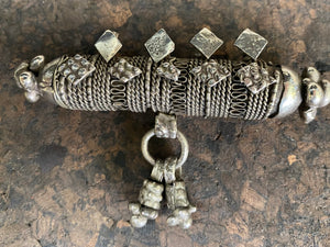 High grade, heavy silver amulet with fused ends, mid 19th century, from Afghanistan. Length 8.5 cm
