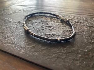 Our signature bracelet style, crafted from polished coconut wood and Karen hill tribe 95% silver. This women or men's bracelet has a casual Boho vibe, is understated, chic and modern, and is made for that stacked bracelet look.