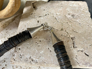 Statement necklace with an African vibe. Made from vintage wood heshi beads and Arizona turquoise, highlighted with vintage ostrich eggshell beads. The necklace is finished with handmade silver cone ends and a generous hook clasp. length 57 cm