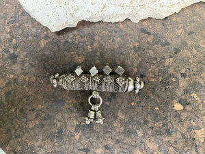High grade, heavy silver amulet with fused ends, mid 19th century, from Afghanistan. Length 8.5 cm