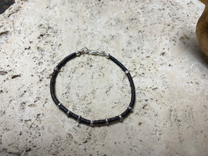 One of our signature coconut silver bracelets, crafted from polished coconut wood and hill tribe 95% silver., with sterling silver lobster clasp. A women's bracelet or a men's bracelet, it has a casual Boho vibe, and is made for that stacked bracelet look. Different sizes available