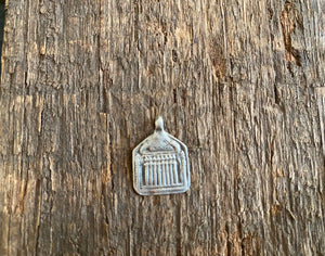 Antique silver amulets representing the Hindu god Skanda and the seven mothers, traditionally worn for protection. Early 19th - early 20th century