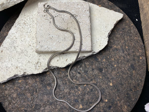 Long open weave non-silver snake chain is heavy and strong, with a dark, oxidised silver finish and S clasp.